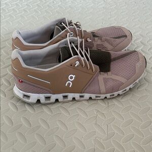 On Running Tan and White Athletic Shoes